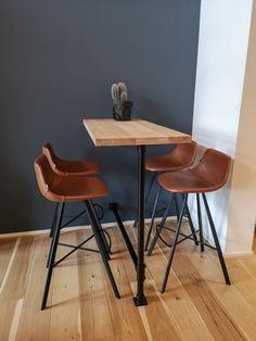 two chairs and a table in a room