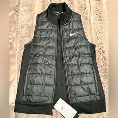 Brand New With Tags Womens Black Running Vest Size Xs. Functional Black Vest For Fall, Sporty Black Vest For Spring, Functional Black Outerwear For Spring, Functional Black Spring Outerwear, Black Sports Vest For Spring, Nike Black Outerwear For Spring, Black Sports Vest For Winter, Black Winter Sports Vest, Black Athleisure Outerwear For Layering