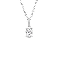 This solitaire pendant has the perfect mix of style and simplicity. The high-quality diamond in oval shape is secured by four prongs. It gently drops from a white gold bail with a knife-edge detail. Classic Oval Pendant Diamond Necklace With Prong Setting, Classic Diamond Oval Pendant Necklace With Prong Setting, Formal Solitaire Oval Pendant Necklace With Prong Setting, Classic Solitaire Teardrop Pendant Necklace With Prong Setting, Classic Oval Pendant Necklace With Prong Setting, Classic Necklace With Oval Pendant And Prong Setting, Classic Solitaire Teardrop Pendant Necklace, Classic Teardrop Solitaire Necklace, Oval Diamond Solitaire Necklace With Prong Setting