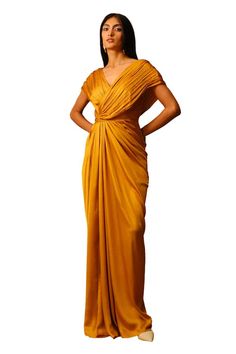 Mustard voile full length dress with criss cross pleated bodice. - Aza Fashions Silk Pleated V-neck Maxi Dress, Pre-draped V-neck Maxi Dress For Cocktail, Pleated V-neck Maxi Dress For Gala, V-neck Maxi Dress With Pleated Back For Gala, Pre-draped Maxi Dress With Folds, Pre-draped V-neck Cocktail Evening Dress, Draped Pleated Maxi Dress For Wedding, Floor-length Silk Dress With Folds, Pleated Draped Maxi Dress For Wedding