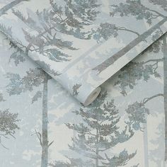 an image of a wallpaper with trees in the woods on it's side