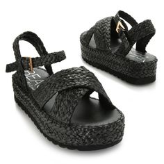 Braided raffia and and adjustable buckle make these platform sandals stand tall in your wardrobe. When you're packing for your next glamorous vacation, don't forget to slip these Sunshine sandals in your bag. They're also quite lightweight making them an easy choice Straw Platform Sandals For Vacation, Trendy Buckle Closure Wedge Sandals For Vacation, Black Straw Sandals For Beach, Vacation Black Straw Sandals, Straw Sandals With Buckle Closure For Beach, Trendy Wedge Sandals With Adjustable Strap For Beach, Chic Sandals With Adjustable Strap For Vacation, Summer Vacation Wedge Sandals With Adjustable Strap, Chic Summer Wedge Sandals With Adjustable Strap