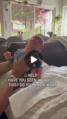 an older man holding a baby in his lap with the caption help have you seen a baby? this do you know what it is?