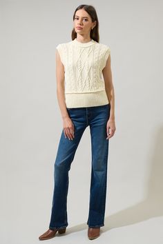 Pair your favorite jeans with the Loreli Cable Knit Sweater Vest Top. It has a textured and pretty design on it. It also features a classic round neck with a sleeveless look. Add on sneakers for a casual look.- Cable knit- Ribbed sweep- Drop sleeve- Classic fit- Comes in 2 ColorsSize + Fit - Model is 5'11" and wearing size XS- Measurements taken from size S - Chest: 17 1/2"- Length: 21 1/2" Fabric Self: 88% Polyester 12% Nylon Style Number STT17335 Cable Knit Sweater Vest, Drop Sleeve, Wrap Jumpsuit, Knit Sweater Vest, Bra Dress, Body Dress, On Sneakers, Pretty Design, Cable Knit Sweater