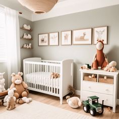 a baby's room with stuffed animals and toys