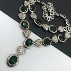 495.00 USD Vintage Jewelry Set, rhinestone, necklace earring set, 1980s collectible, fashion jewelry, Retro Demi Parure Very pretty rhinestone jewelry set in excellent vintage condition. Necklace measures 16 1/4 inches long Bracelet measures 7 1/4 inches long by just over 1/2 inches wide Very pretty collectible set. #vintage #jewelryset #vintagejewelry #necklace #bracelet #demi d903 Green Rhinestone Necklace For Formal Occasions, Vintage Green Crystal Jewelry, Formal Green Rhinestone Necklace, Retro Green Jewelry For Evening, Long Bracelet, Rhinestone Jewelry Set, Desert Hot Springs, Vintage Jewelry Sets, Vintage Vogue