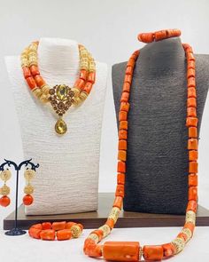 Handcrafted African Coral Beads Necklace - Unique Ethnic Jewelry for a Statement Look NEED OTHER DESIGNS OF BRIDE AND GROOM CORAL BEADS, AFRICAN PRE-TIED HEADWRAPS, BRAIDED WIGS AND AFRICAN GIFT ITEMS, VISIT OUR SHOP HERE: https://sereneafrica.etsy.com/ Materials: 1. Natural/Original African Coral bead 2. Gold color accessories  3. This listing contains 3 layers of necklace, 2 bracelets, a set of dangling earrings for bride/woman and 2 pieces of necklace and 1 bracelet for men. PLEASE NOTE THE V Bohemian Polished Beads For Wedding, Bohemian Gemstone Beads For Wedding, Bohemian Gold Bridal Necklace With Polished Beads, Traditional Gold Bridal Necklace With Large Beads, Traditional Gold Bead Necklaces For Ceremonies, Traditional Oval Bead Necklaces For Weddings, Traditional Oval Beads Necklaces For Weddings, Traditional Necklaces With Oval Beads For Weddings, Handmade Gold Beaded Necklaces For Traditional Ceremonies