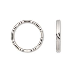 a pair of silver hoop earrings on a white background