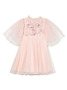 Introducing the Shanti Aria Tulle Dress, where grace meets beauty. Featuring delicate tulle bell sleeves and a full a-line skirt, this dress is perfect for special occasions. Hand-embellished flowers cascade across the bodice, leaving your little one feeling like a flower in full bloom! Shipping and Returns This product can be returned/exchanged within 20 days of receiving the item. All orders are dispatched from our Sydney, Australia warehouse. SHIPPING EST. TIMEFRAME FREE FOR ORDERS OVER Inter Tulle Dress With Flutter Sleeves For Dress-up, Tulle Dress With Flutter Sleeves For Party, Pink Tulle Dress For Ceremony, Ceremony Embellished Tulle Dresses, Spring Celebration Dresses With Ruffles, Spring Dresses With Ruffles For Celebration, Party Dresses With Embroidered Sleeves In Organza, Embellished Organza Dress For Celebrations, Spring Ceremony Dresses With Ruffles