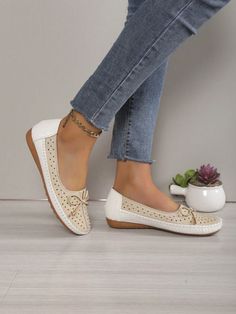 Stay stylish and comfortable this summer with our breathable cutout <a href="https://canaryhouze.com/collections/women-canvas-shoes" target="_blank" rel="noopener">slip-on</a> loafers for women. These flats provide both fashion and function Comfortable Summer Slip-on Loafers, Beige Flat Bottom Slip-ons, Comfortable Slip-on Summer Loafers, Summer Slip-on Loafers With Perforations, Summer Slip-on Loafers, Comfortable Slip-on Loafers For Summer, Spring Slip-on Flats With Perforations, Casual Flats With Perforated Toe Box, Casual Closed Toe Flats With Perforated Toe Box