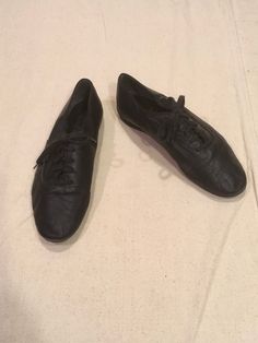 "Vintage 1980s women's dance shoes Capezio Ballet Makers of USA black leather lace up low top soft suede sole w/rubber Cat Paw brand sole caps good vintage condition, light wear label size womens 6 1/2 M measures, insole-9\" sole-9 1/2\" width-3 1/4\" heel-1/2\" total height-2 3/4\"" Leather Dance Shoes With Leather Sole For Practice, Casual Dance Shoes With Rubber Sole, Fitted Lace-up Dance Shoes With Rubber Sole, Fitted Lace-up Dance Shoes With Leather Sole, Low-top Leather Dance Shoes With Rubber Sole, Leather Low-top Dance Shoes With Rubber Sole, Casual Leather Dance Shoes With Rubber Sole, Black Slip-on Dance Shoes With Leather Sole, Black Leather Sole Slip-on Dance Shoes