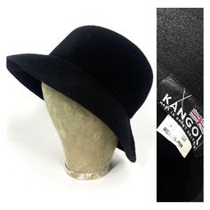 80s black wool hat by Kangol, design called Modeleine. So British and timeless.  Can be worn up and down. Soft shape. Quite deep (circa 11cm) Brim with few rows of stitching. No Kangol logo externally. Nice condition. SIZE: Regular M Brim: 7cm Internally: 55cm Retro Black Hat For Fall, Retro Winter Bucket Hat With Curved Brim, Retro Curved Brim Bucket Hat For Winter, Winter Retro Curved Brim Bucket Hat, Retro Brimmed Bucket Hat For Winter, Retro Brimmed Winter Bucket Hat, Retro Wide Brim Cloche Hat For Winter, Winter Retro Brimmed Bucket Hat, Adjustable Black Felt Bucket Hat