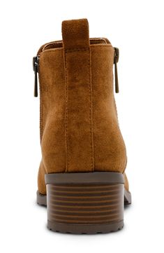 A chunky, stacked heel gives modest height to a classic round-toe bootie designed with iFlex technology for flexible comfort from day to night. 1 2/" heel Side zip closure Cushioned insole Textile upper/synthetic lining and sole Imported Brown Ankle Boots With Stacked Heel, Brown Cushioned Ankle Boots, Brown Ankle Boots With Cushioned Footbed, Ankle Boots With Cushioned Footbed For Fall, Brown Boots With Zipper Closure And Block Heel, Brown Low Heel Boots With Buckle Closure, Brown Booties With Buckle Closure Medium Width, Brown Booties With Buckle Closure, Brown Boots With Heel Tab