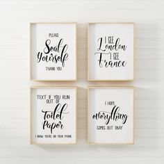 four framed art pieces with hand lettering on them