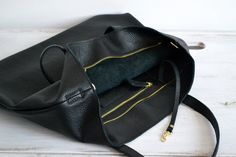 "BLACK LEATHER TOTE BAG - Leather zipper tote carry-on everyday bag. Express delivery by UPS for ONLY 15$ MORE! Please add your phone number for courier, in comment to order. 3-4 business days to US and Canada, 1-2 days in EU, 3-5 days worldwide. Regular shipping: 7-10 business days to US and Canada, 3-5 days in EU, 10-15 days worldwide. Simple and roomy tote bag made from high quality pebbled leather. This large tote bag is suitable for carrying everything in your everyday life. Spacious interi London Bag, Leather Hobo Bags, Oxblood Leather, Black Leather Top, London Bags, Large Leather Tote Bag, Black Leather Tote Bag, Women Leather Backpack, Large Leather Tote