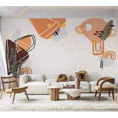 a living room filled with furniture and paintings on the wall next to a white couch