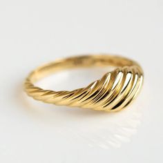 Every jewelry box needs a luxe solid gold statement ring that will never go out of style.  Enter the Solid Gold Twisted Signet Ring.  This beauty is has it all: golden glow, a chic silhouette, and vintage inspired charm. Family Gold is a Local Eclectic exclusive. 9k solid yellow gold Height 6.8 mm Band width tapers to Minimalist Gold Ring, Delicate Gold Ring, Dainty Gold Ring, Local Eclectic, Dainty Gold Rings, Gold Statement Ring, Plain Bands, Golden Glow, Ring Minimalist