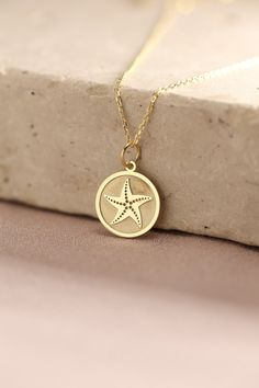 Gold Starfish Pendant - Seashell Gold Necklace ● Material of pendant: Solid Gold 14k ( REAL GOLD ) ● Metal Stamp: 14k ( REAL GOLD ) ● The pendant is available in 5 sizes: - 12,7 mm / 0.5 inches (Diameter) - 14,0 mm / 0,55 inches ( Diameter ) In the photos - 15,3 mm / 0.6 inches ( Diameter ) - 16,5 mm / 0,65 inches ( Diameter ) - 19,1 mm / 0,75 inches ( Diameter ) ( In the photos the size is 14mm / 0.55 inches Diameter ) ( Jump Ring inner diameter: 4 mm ) ● Material of chain: Solid gold 14k ( REA Yellow Gold Starfish Necklace As Gift, Yellow Gold Star Necklaces With Starfish Charm, Gold Jewelry With Starfish Charm As A Gift, Gold Jewelry With Starfish Charm For Gift, Ocean-inspired Round Jewelry With Starfish Charm, Starfish Shaped Jewelry With Star Charm As Gift, Gold Starfish Charm Necklace Gift, Starfish Charm Pendant Necklace For Gift, Starfish Charm Pendant Necklace Gift