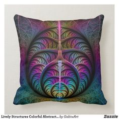 a pillow with an abstract design on the front and back side, which is multicolored