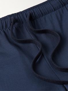 Cut from soft stretch Micro Modal jersey, these elasticated 'Basel 1' lounge shorts by Derek Rose are a great Sunday morning indulgence. Team them with a T-shirt and slippers to keep things simple and stylish. This product was made from Considered Materials. Find out more about our Craftsmanship Code here. Solid Cotton Sleepwear With Elastic Waistband, Comfortable Navy Bottoms For Loungewear, Comfortable Navy Loungewear Bottoms, Comfortable Stretch Sleepwear In Short Length, Comfortable Stretch Sleepwear Short Length, Comfortable Stretch Sleepwear, Short Length, Elastic Waistband Sleep Shorts, Sleep Bottoms With Elastic Waistband, Elastane Bottoms With Elastic Waistband For Loungewear