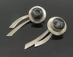 "MEXICO 925 Sterling Silver - Vintage Black Onyx Modernist Drop Earrings - EG9520  MEXICO 925 Sterling Silver - Vintage Black Onyx Modernist Drop Earrings - EG9520  Jewelry Type:         Earrings   Metal Type:            925 Silver   Metal Size:             2.75\"  Stone Type:            Onyx   Condition:              N/A  Jewelry Weight:     21.9 Grams  PLEASE NOTE: THIS ITEM IS PRE-OWNED. ALTHOUGH MOST ITEMS ARE IN VERY GOOD CONDITION, SOME MAY NEED CLEANING AND/OR MINOR REPAIRS. WE MAKE A VER Clear Pictures, Earrings Metal, Antique Rings, Black Onyx, Handcrafted Jewelry, Beautiful Necklaces, Types Of Metal, Vintage Black, Black Silver