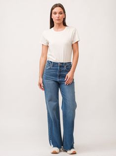 These high-rise wide leg jeans are a must-have! With a cozy fit at your natural waist, they highlight your curves and hips beautifully. Made from comfy stretch denim, they feature fun details like hand-sanded hip whiskers, pocket grinding, and stylish frayed edges. Fit is slightly snug, give sometime to ease in, or may go up one size. Model is wearing a size 27. Lake Life Decor, Fall Linen, High Rise Wide Leg Jeans, Dear John, Capri Blue, Cozy Fits, Light Sweater, Latest Outfits, Wide Leg Denim