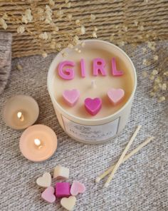 The perfect candle to celebrate a new baby girl.   The candle is presented in a neutral glass jar topped with cute pink wax letters and hearts.  The candle will last upto 60 hours in a fabulous scent of your choice.  Once lit, the candle will reveal a beautiful display of colors and shimmer that the recipient will love. A truly unqiue gift they will be sure to remember.  Each candle is highly fragranced and made by us in our Manchester studio using the highest quality ingredients. The candle is packed by hand in our signature gift box filled with shredded paper, completely free of plastic.   Each candle comes as standard with a set of our beatiful candle matches. The box is filled with approximately 15-20 matches which are 8cm long.   For more candles like this, please see our shop.  A bit Wax Melts Recipes, Baby Reveal Cakes, Beeswax Candles Diy, Candle Workshop, Dog Candle, Baby Shower Candles, Candle Matches, Star Baby Showers