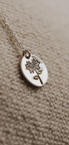 November's birth flower is the Chrysanthemum. This November birth flower necklace is a great birthday gift for friends, family, or even yourself. It features a gold or sterling silver charm hand-stamped with a Chrysanthemum design. The perfect personalized cute jewelry gift to celebrate your special someone's November birthday. Visit everaster.com to see this Chrysanthemum flower necklace and more birth flower by month jewelry. Everyday Flower Charm Jewelry, Spiritual Sterling Silver Jewelry With Birth Flower, Spiritual Everyday Jewelry With Birth Flower, Everyday Spiritual Jewelry With Birth Flower, Everyday Flower Shaped Jewelry For Mother's Day, Everyday Flower Necklace With Flower Charm, Sterling Silver Birth Flower Necklace For Mom, Sterling Silver Daisy Flower Charm Jewelry, Sterling Silver Daisy Jewelry With Flower Charm