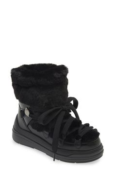 The label's signature mountaineering warmth is highlighted through the plush faux-fur paneling of this leather snow boot complete with an ultragrippy traction sole. Lace-up style Leather and textile faux-fur upper/textile and textile faux-fur lining/rubber sole Imported Designer Shoes Black Fur Boots, Fur Boots Women, Fur Snow Boots, Leather Snow Boots, Snow Boot, Snow Boots Women, Quilting Tips, Fur Boots, Fabric Gift Bags