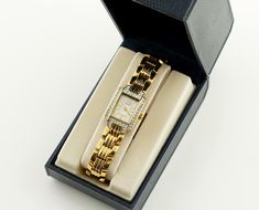 This vintage Sekonda watch, nestled in its original box, features a rectangular case adorned with sparkling stones and a stunning mother-of-pearl dial that accentuates its luxurious appeal. The stylish and eye-catching bracelet adds a touch of glamour, making it a standout piece.  Dimensions: Bracelet Length: up to 18.6 cm (7.3 inches) - adjustable Case Width: 1.8 cm (0.7 inches) Case Height: 2.3 cm (0.9 inches) Bracelet Width: 1.2 cm (0.47 inches) Condition: The watch is in excellent condition, with details visible in the photo. All watches come with original boxes but without documents. All presented watches are tested and in working condition, also equipped with new batteries. If you need the watch size adjusted, please write to me about it.  More watches in my shop: https://lexvintageb Sekonda Watch, Vintage Watches Women, Watch Gift, Women's Watch, Women Wrist Watch, Ladies Watch, Wrist Watches, Favorite Things Gift, Wedding Shop