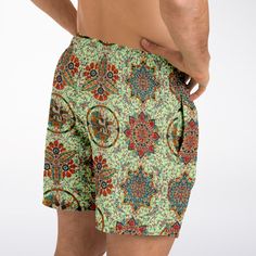 Our Mozaic Swim Shorts have a ornate mosaic tile print taking inspiration from church ceiling styles popular during the Byzantine Era and art of that period. This item is made to order. Allow 3 weeks for delivery. Made to order products promote sustainability by ensuring there is no end of season or left over unsold product that would end up wasted. Please consult the size chart below. • Fabric: 100% Polyester Twill • Elastic waistband • Round drawstring • Mesh basket lining • Mesh-lined side po Green Printed Swim Trunks For Summer, Bohemian Green Bottoms For Poolside, Green Bohemian Bottoms For Poolside, Green Printed Beachwear Swim Trunks, Green Printed Swim Trunks Beachwear, Green Printed Swim Trunks For Beachwear, Green Paisley Print Bottoms For Summer, Multicolor Bottoms With Geometric Pattern For Summer, Summer Green Paisley Print Bottoms