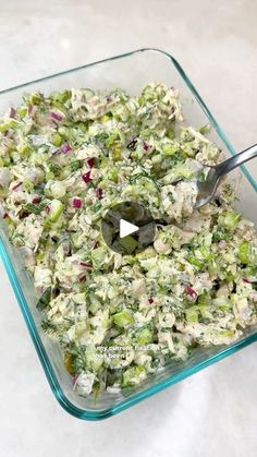 a glass casserole dish filled with celery and other vegetables