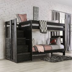 a bunk bed with drawers underneath it in a room