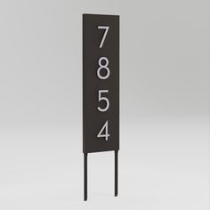 a black sign with the number seventy and four digits on it's front side