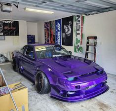 a purple car is parked in a garage