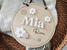 a wooden sign that says mia rose on it