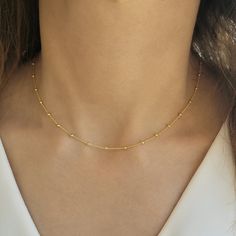 ✔️A Lovely necklace for a stunning look✔️ This satellite choker is great for wearing alone or for layering with other necklaces. It is the perfect gift for your girlfriend, sister, bridesmaids, or even yourself! >>IS IT A GIFT? This minimalist necklace comes in a beautiful gift package. If you wish to send a personal message, please make a comment at the checkout process! >>SIZE This beaded chain choker is available in length of 12, 13, 14, 15 , 16, 17, 18, 19 , 20 inches (30-33- 35- Trendy Gold Beaded Chain Choker, Minimalist Gold Choker With Satellite Chain, Gold Choker With Satellite Chain, Minimalist Beaded Chain Choker For Gift, Minimalist Beaded Chain Choker As Gift, Trendy Gold Choker With Tiny Beads, Trendy Gold Beaded Necklace With Delicate Chain, Minimalist Beaded Choker With Delicate Chain, Dainty Gold Choker With Round Beads