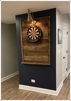 a dart board mounted to the side of a wall