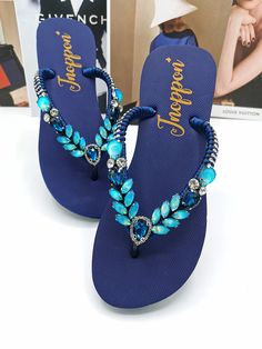 Description The beautiful rhinestone and customizable Flip Flops for the beach brides, bridesmaids, vacation, honeymoon or any occasion you desire to look gorgeous. Perfect in any outfit! Being unique and stunning on design, these flip flops must be your must-have item! The sandal is anti-slip, comfortable and durable as it is made from high quality rubber from the South of Thailand, where is famous for the best rubber tree. Moreover, the crystals are decorated on the sandal with effective adhes Elegant Rhinestone Sandals For Beach Season, Summer Party Flip Flops With Rhinestones, Embellished Flip Flops With Round Toe For Beach, Embellished Flip Flops For Beach, Beach Embellished Flip Flops, Summer Rhinestone Toe Post Flip Flops, Summer Toe Post Flip Flops With Rhinestones, Elegant Rhinestone Flip Flops For Summer, Adjustable Rhinestone Sandals For Beach Season