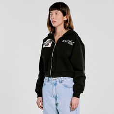 It would be an honor to have you join the team. The "S'envoler Black Zip-up" is a cropped silhouette, one that we sits perfectly at the waist. Quality means everything to us. Being part of our team requires dedication to your craft and willingness to evolve. Material - Heavy-weight 14 oz. 100% American cotton, shrink freeFeatures - Embroidered logo on front with a screen printed canvas patch, screen-printed by hand in house on backFit - Unisex, cropped, regular sleeve length Male model is 6'0, w French Terry Outerwear With Drawstring Hood For Streetwear, Hooded French Terry Top With Double-lined Hood, Varsity Hoodie For Streetwear, Throwback Winter Hoodie Tops, Throwback Winter Hoodie, Varsity Sweatshirt With Adjustable Hood For Streetwear, Throwback Streetwear Hoodie For Fall, Fall Streetwear Throwback Hoodie, Hooded Throwback Tops For Streetwear