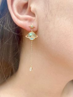 ✔ Planet earrings solar system, dainty and trendy earrings jewelry  *Length: 2.18" *Width: 0.56" *Gold Pated  ♥ T A K E ♥ G O O D ♥ C A R E ♥  Please follow these tips to keep it longer. Keep it in a dry place. Please take it off before bathing, exercising, or swimming. Don't wear it in the pools, the ocean, or in hot tubs. Keep perfume, sunscreen, lotions, hairspray, and other chemicals off your jewelry. Store it in an air-tight container when you don't wear it. * RETURNS AND EXCHANGES TERMS ♥ Gold Space-themed Earrings Gift, Space-themed Gold Earrings Gift, Space-themed Dangle Jewelry Gift, Space-themed Drop Earrings As Gift, Solar System Jewelry, Saturn Earrings, Saturn Planet, Planet Earrings, Moon And Star Earrings