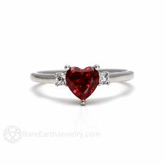 Ruby Ring Ruby Engagement Ring Heart Promise Ring 3 Stone Diamonds 14K or 18K Gold Red Gemstone Ring July Birthstone by RareEarth on Etsy https://www.etsy.com/listing/200970205/ruby-ring-ruby-engagement-ring-heart Fine Jewelry Three Stone Rings For Proposal, Valentine's Day Gemstone Rings Fine Jewelry, Valentine's Day Gemstone Fine Jewelry Rings, Valentine's Day Fine Jewelry Gemstone Rings, Valentine's Day Classic Birthstone Ring, Valentine's Day Promise Diamond Ring With Birthstone, Red Diamond Heart Ring For Anniversary, Red Heart Shaped Diamond Anniversary Ring, Red Heart Diamond Ring For Anniversary