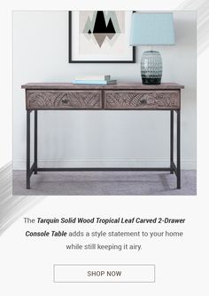 the tarquinn solid wood tropical leaf carved 2 drawer console table adds a style statement to your home while still keeping it any