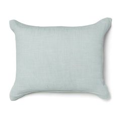 a light blue pillow on a white background