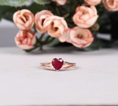 Rubies are considered the stone of the heart and are said to enhance the ability to give and receive unconditional love. Gemstone: Natural Ruby  Shape: Heart 7MM  Finish Type: White rhodium/ yellow gold plating/rose gold plating / Solid14K Gold also available Ring Size: US Ring sizes 3-12  Metal Type: 925 Sterling Silver / Solid14KGold 14K Rose Gold Ruby Engagement ring , Birthstone jewelry, Heart Shaped Ruby Ring, Wedding Promise ring, Personalized Gifts ,Bridal Ruby Ring Rose Gold Ruby Ring For Valentine's Day Gift, Gemstone Ring For Valentine's Day Promise, Heart-shaped Gemstone Ring For Valentine's Day, Promise Ring With Gemstone For Valentine's Day, Valentine's Day Promise Ring With Gemstone, Heart-shaped Solitaire Birthstone Ring Gift, Oval Heart Ring For Valentine's Day Promise, Oval Heart Promise Ring For Valentine's Day, Heart-shaped Ruby Jewelry For Wedding