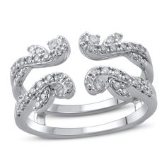 two pieces of white gold ring with diamonds on each side and an open design in the middle