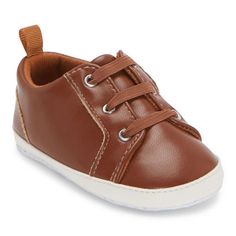 Add these cute boy's sneaker crib shoes from So Adorable to his shoe collection. Made from smooth faux leather, these stylish slip-on shoes have a round toe. Style with tailored pants, shorts, or jeans. Closure Type: Slip-OnShoe Heel Height: FlatUpper/Outer Base Material: 100% PolyuretheneShoe Lining Material: PolyurethaneSole Material Content: 100% PolyurethaneToe Type: Round ToeCare: Spot CleanHeel Style: Flat HeelCountry of Origin: Imported Spring Non-slip Leather Sneakers, Brown Non-slip Sneakers For Spring, Synthetic Booties With Rubber Sole And Round Toe, Brown Lace-up Sneakers With Soft Sole, Brown Leather Sneakers With Soft Sole, Leather Low-top Sneakers With Soft Sole, Brown Sneakers With Soft Sole For Playtime, Casual Brown Sneakers For Playtime, Leather Sneakers With Rubber Sole For Playtime