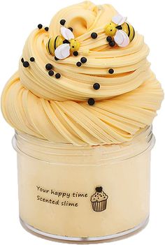 a cupcake in a jar with bees on top that says your happy time scented slime