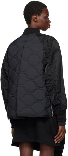 Quilted nylon twill and polyester-blend ripstop bomber jacket. Faille trim throughout. · Paneled construction · Rib knit stand collar and cuffs · Two-way zip closure · Welt pockets · Zip vent at side seams · Inverted pleat at back · Full quilted taffeta lining Supplier color: Black Black Outerwear With Ribbed Collar For Layering, Fall Nylon Outerwear With Zip Cuffs, Nylon Outerwear With Zip Cuffs For Streetwear, Nylon Outerwear With Ribbed Cuffs For Streetwear, Black Nylon Outerwear With Ribbed Cuffs, Urban Outerwear With Ribbed Cuffs For Layering, Nylon Outerwear With Zip Cuffs For Work, Nylon Outerwear For Fall Layering, Nylon Outerwear For Layering In Fall