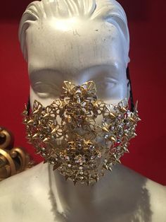 Very versatile and comfortable to wear. Wear as a half mask, full face mask or as a headband. Gold in color with spikes and clear crystals. Total must have. Crystal Mask, Mask Full Face, Gold Face Mask, Golden Spike, Headband Gold, Half Mask, Full Face Mask, Frozen 2, Clear Crystals